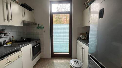 Küche mit Austritt zur Terrasse - 