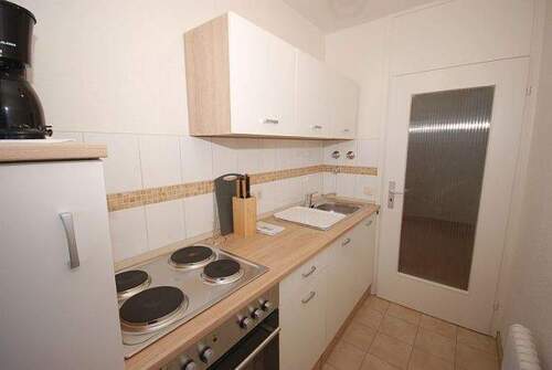 Küchenraum mit Einbauküche - 