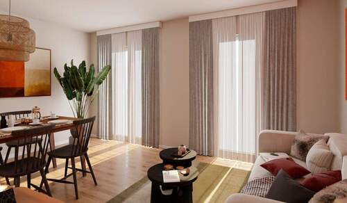 Im Wohnzimmer kommt Ihre Familie zusammen - Moderne Maisonettewohnung mit Terrasse und Garten