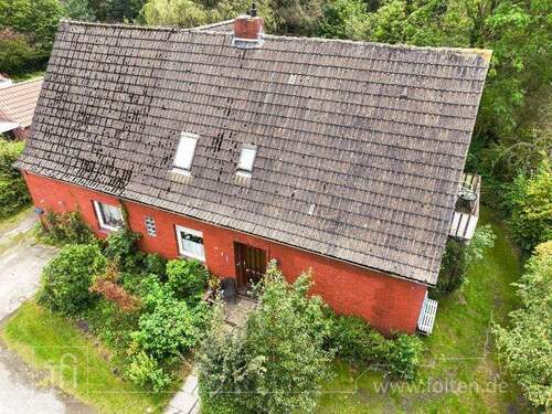 Aussenansicht Straßenseite - 9 Zimmer Einfamilienhaus zum Kaufen in Moormerland