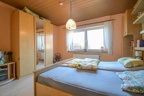 Schlafzimmer - Bungalow mit 112,40 m&sup2; in Edewecht zum Kaufen