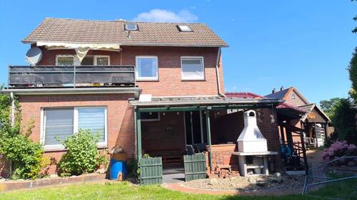 Rückansicht - Mehrfamilienhaus, Wohnhaus mit 175,00 m&sup2; in Varel zum Kaufen