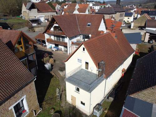 Rückansicht - 1 Zimmer Mehrfamilienhaus, Wohnhaus in Hefersweiler