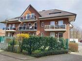 Hausansicht Gartenseite - Top modernisierte Zweizimmer Wohnung