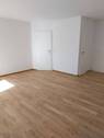 Wohnzimmer mit Blick zum Flur - 2 Zimmer Etagenwohnung in Wildeshausen