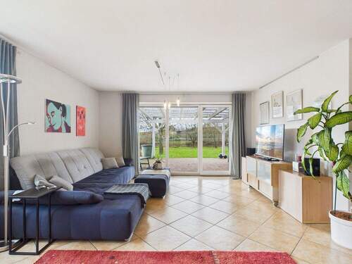 Wohnbereich mit Zugang zur Terrasse - 