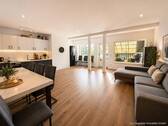 Wohnzimmer - Modernisiertes Einfamilienhaus mit attraktiver Mieteinnahme, großzügigem Garten, Garage & Carport