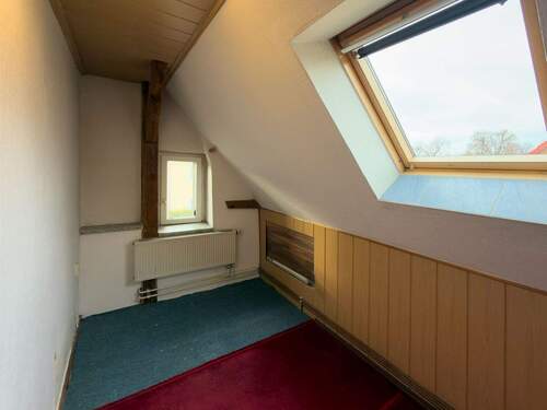 Zimmer im Dachgeschoss - 