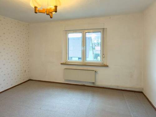 Zimmer im Dachgeschoss - 