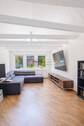 gemütliches Wohnzimmer - 3 Zimmer Mehrfamilienhaus, Wohnhaus in Delmenhorst