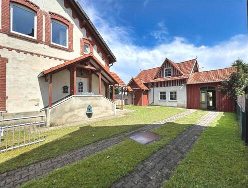 Innenhof - 1 Zimmer Mehrfamilienhaus, Wohnhaus zum Kaufen in Unterlüß
