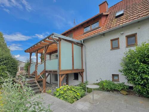 Veranda und Hauseingang - Vorderansicht - 