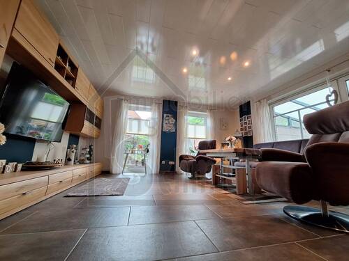 Wohnzimmer - Einfamilienhaus mit 184,00 m² in Bunde zum Kaufen