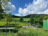 Umzäunter Grill- und Spielplatz für die Anwohner - 2 Zimmer Etagenwohnung zum Kaufen in Jena