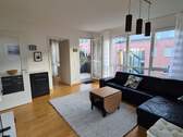 Wohnzimmer - Sonnige 2-Z.-Whg mit Balkon, Aufzug und moderner Ausstattung in Toplage von Haar - provisionsfrei