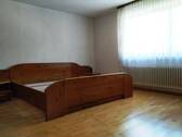 Schlafzimmer mit Holzboden - 