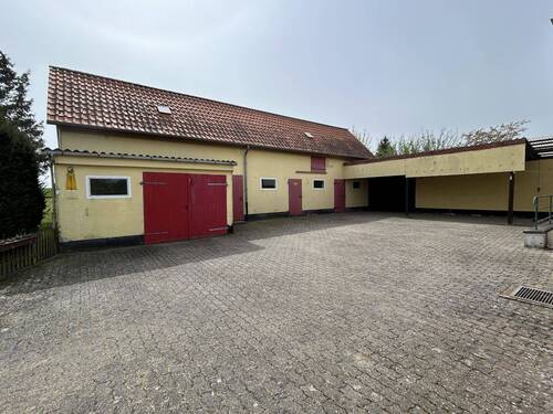 Hof mit Garage und Nebengebäude - Einfamilienhaus mit 120,00 m&sup2; in Uehrde zum Kaufen