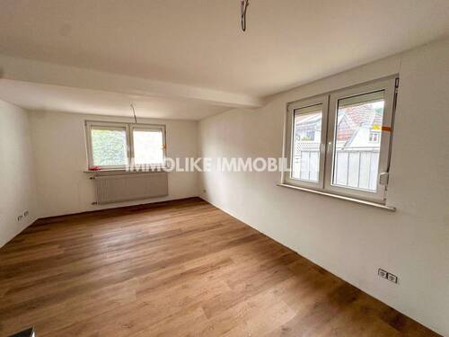 Wohnzimmer - Mehrfamilienhaus, Wohnhaus mit 131,00 m&sup2; in Rieneck zum Kaufen
