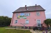 Außenansicht - Mehrfamilienhaus mit Garage und viel Grünfläche zu verkaufen!