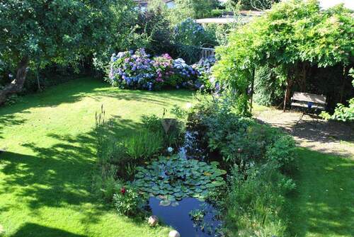Sommergarten mit Laube - 7 Zimmer Einfamilienhaus in Mörfelden-Walldorf / Walldorf
