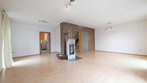 Wohnzimmer mit Kaminofen - 