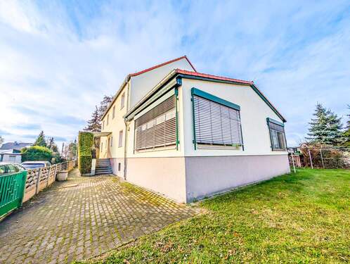 Eckansicht - Mehrfamilienhaus, Wohnhaus mit 311,60 m&sup2; in Parthenstein zum Kaufen