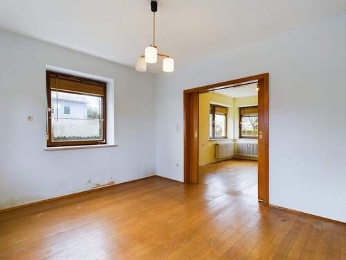 Wohnzimmer - Einfamilienhaus mit 110,00 m&sup2; in München zum Kaufen