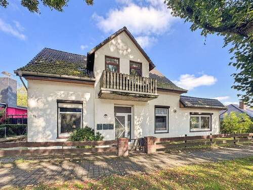 Vorderansicht - 7 Zimmer Mehrfamilienhaus, Wohnhaus zum Kaufen in Ritterhude