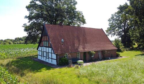 Luftbild Seitenansicht - Einfamilienhaus mit 89,00 m&sup2; in Hopsten zum Kaufen