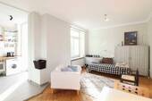 Wohnzimmer - 2 Zimmer Etagenwohnung in München