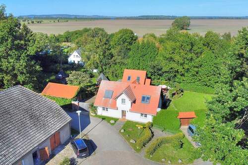 Bild 2 - 8 Zimmer Mehrfamilienhaus, Wohnhaus zum Kaufen in Schaprode
