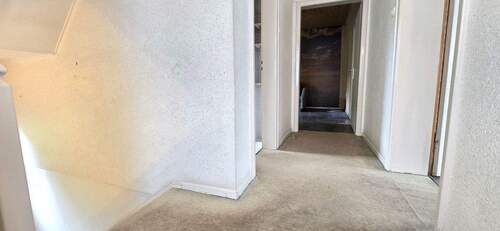 OG: Treppenhaus mit Blick in die Schlafzimmer - 