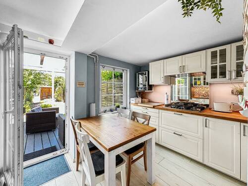 Küche mit Zugang zum Garten - Doppelhaushälfte mit 71,00 m² in Lübeck zum Kaufen