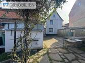 hintere Hausansicht - 5 Zimmer Einfamilienhaus zum Kaufen in Hainspitz