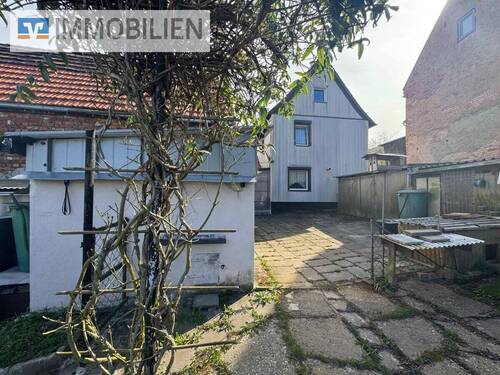 hintere Hausansicht - 5 Zimmer Einfamilienhaus zum Kaufen in Hainspitz