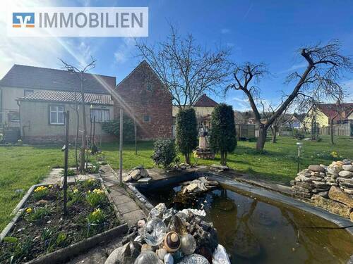 seitliche Hausansicht - 5 Zimmer Einfamilienhaus in Hainspitz