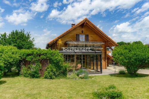 Südansicht mit Wintergarten - Einfamilienhaus mit 103,70 m&sup2; in Reichling zum Kaufen