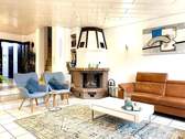 Wohnzimmer mit Kamin - 5 Zimmer Einfamilienhaus in Oberhausen