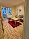 Wohnzimmer mit Balkon - Etagenwohnung mit 58,00 m&sup2; in Berlin zum Kaufen