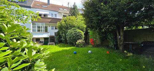 Gebäuderückseite / Garten - 