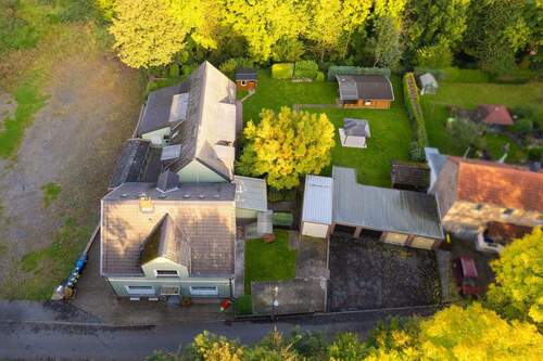 Grundstück - Gepflegtes Mehrfamilienhaus auf großem Grundstück in guter Lage von Bo-Hiltrop zu verkaufen