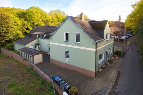 Seitenansicht - 1 Zimmer Mehrfamilienhaus, Wohnhaus in Bochum