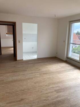 Wohnzimmer Blick zur Küche - 