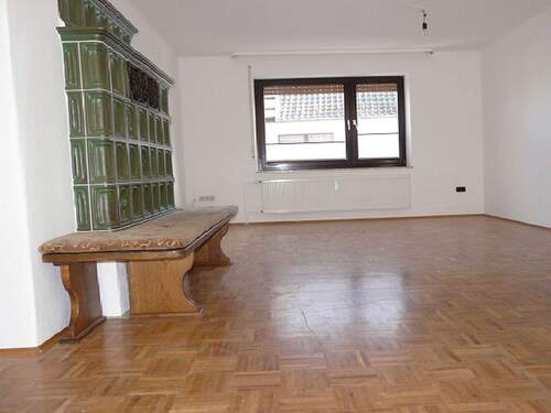 Wohnzimmer mit Kachelofen - 