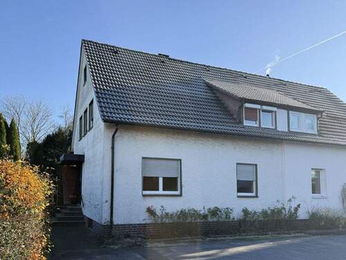 Straßenansicht - 5 Zimmer Doppelhaushälfte zum Kaufen in Rheda-Wiedenbrück