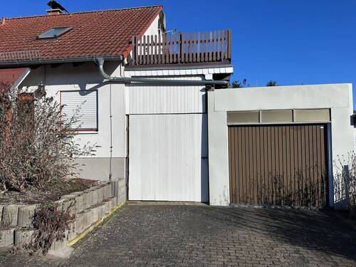Garagenansicht - Einfamilienhaus mit 110,00 m&sup2; in Löwenberger Land zum Kaufen