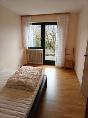Schlafzimmer 2, EG. - 