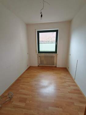 Schlafzimmer 1, 1. OG. - 3 Zimmer Etagenwohnung in Gersfeld (Rhön)