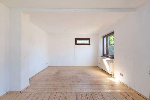 Wohnzimmer, vordere Wohneinheit - 