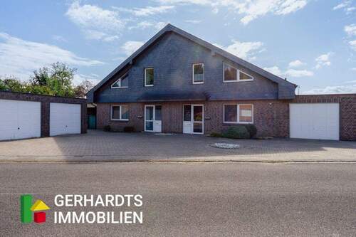 Titelbild - Investieren in Brüggen-Bracht - vermietete 2-Zimmer-Dachgeschosswohnung mit Feldblick und Garage!
